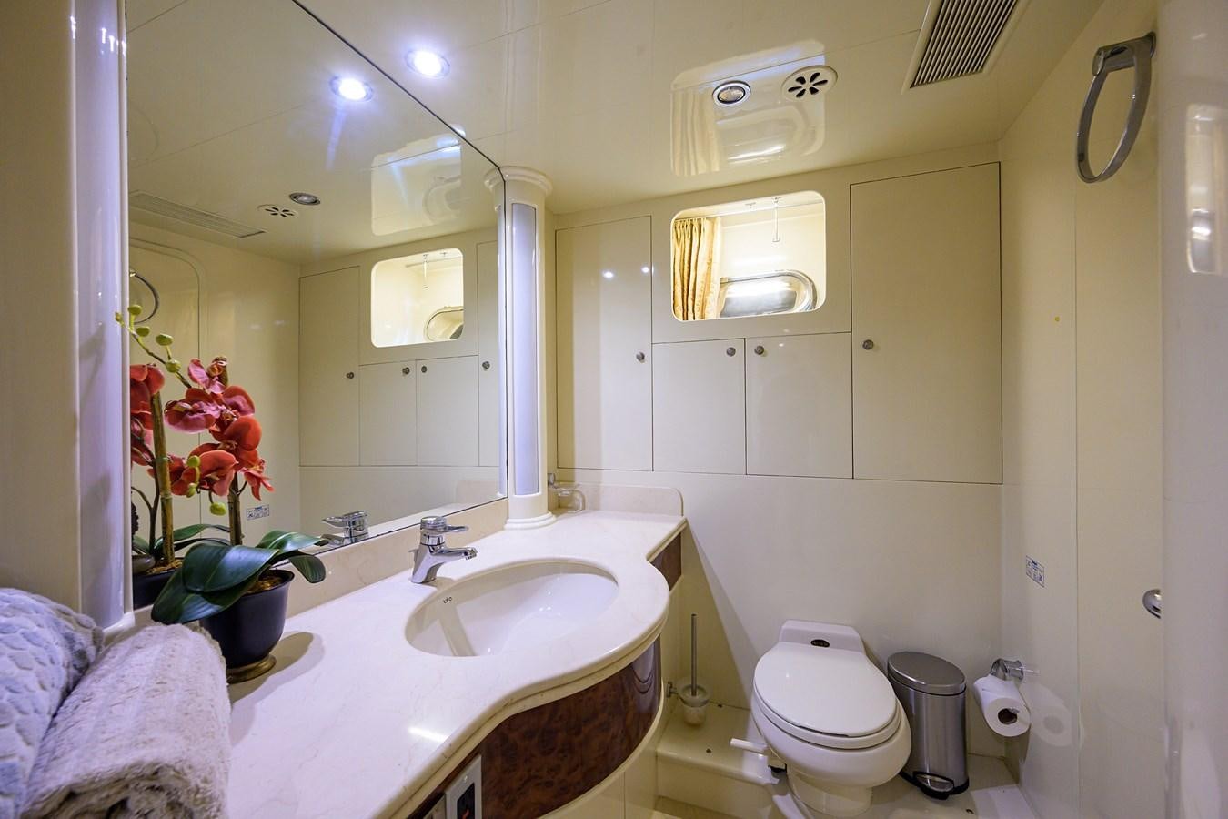 a bathroom with a sink toilet and a bathtub aboard 82 Yacht for Sale