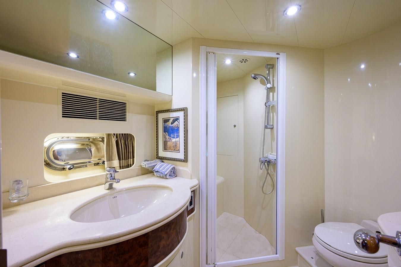 a bathroom with a shower and sink aboard 82 Yacht for Sale