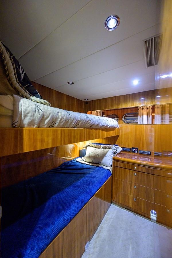 a room with bunk beds aboard 82 Yacht for Sale
