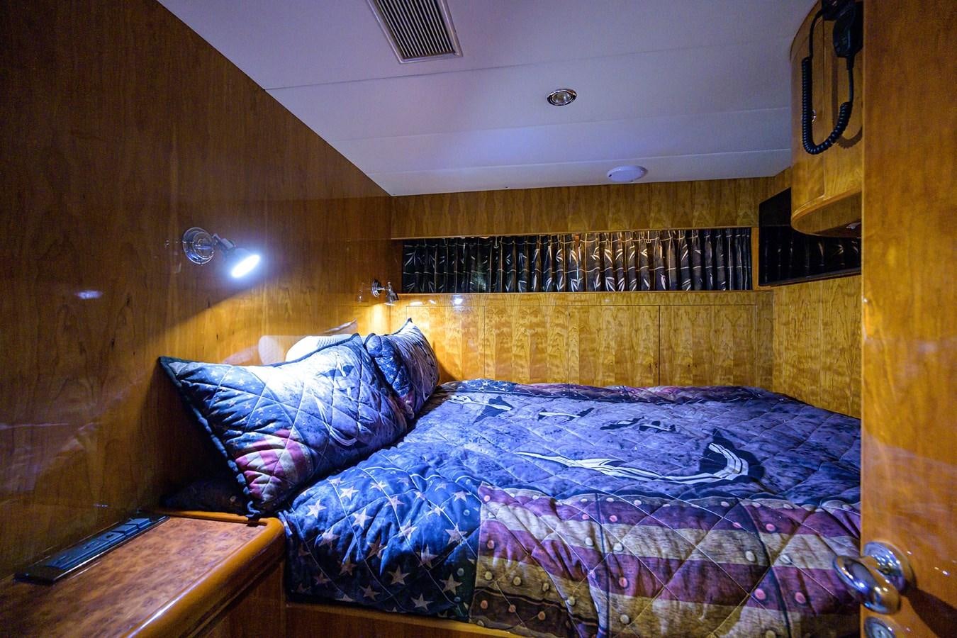 a bed in a room aboard 82 Yacht for Sale