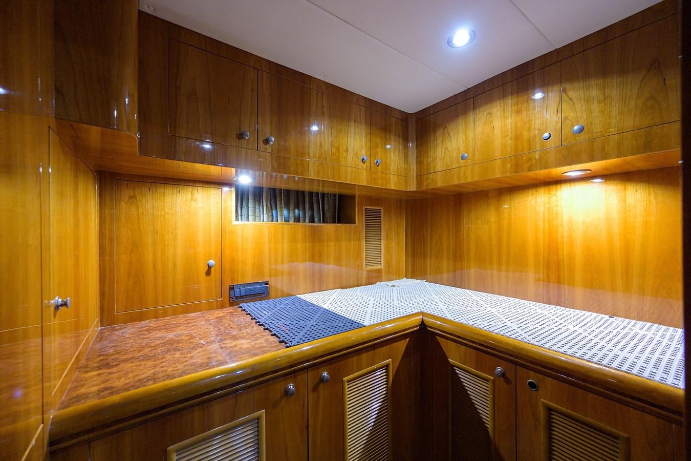 a wooden cabinet with a bar aboard 82 Yacht for Sale