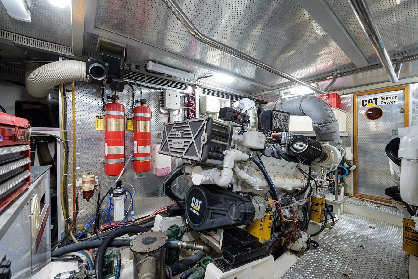 a machine with a large engine aboard 82 Yacht for Sale