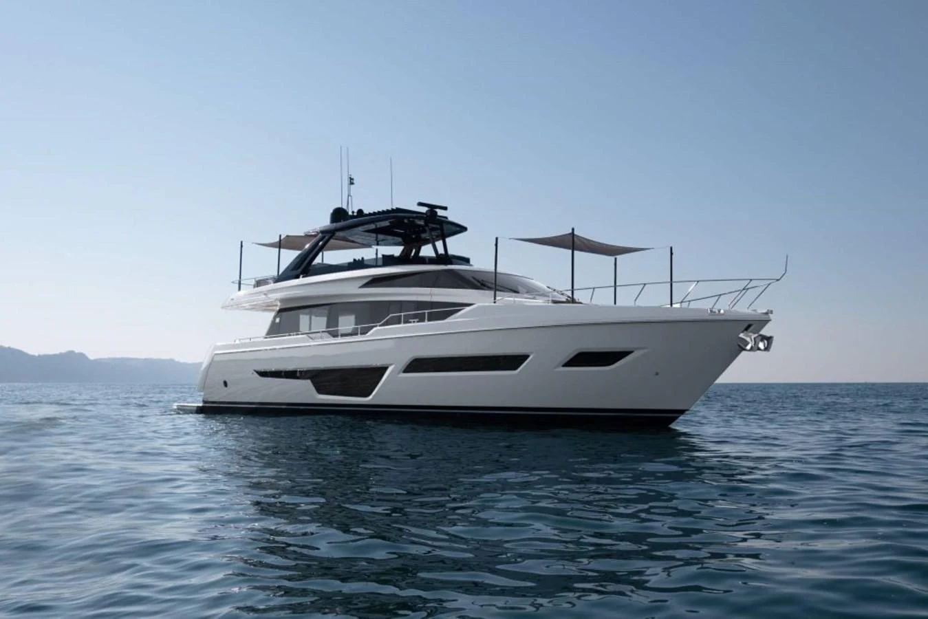 a white yacht in the water aboard 5 PALMS Yacht for Sale