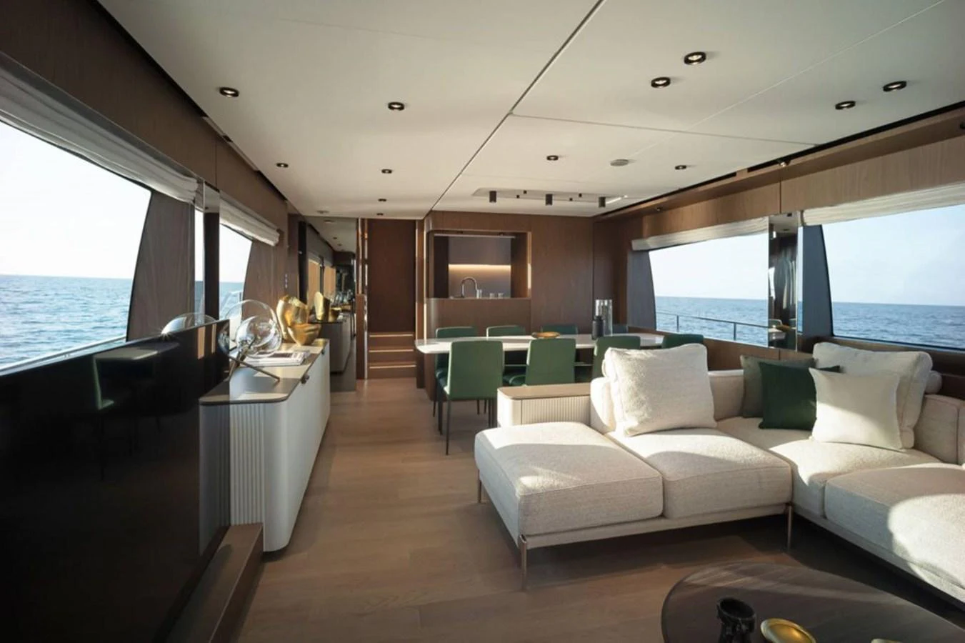 a living room with a large window aboard 5 PALMS Yacht for Sale