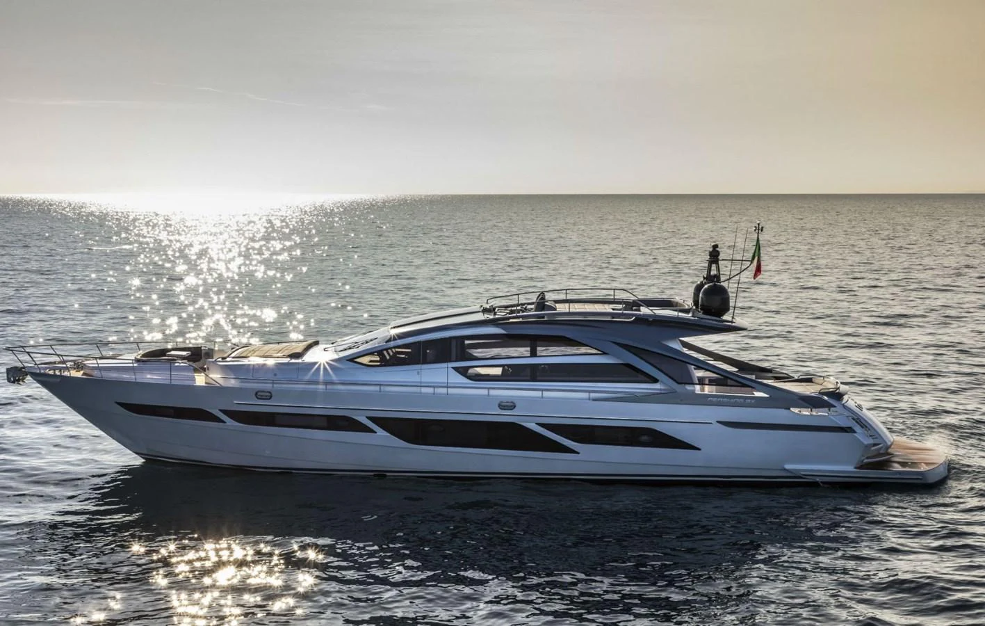 a white yacht in the water aboard 5 PALMS Yacht for Sale