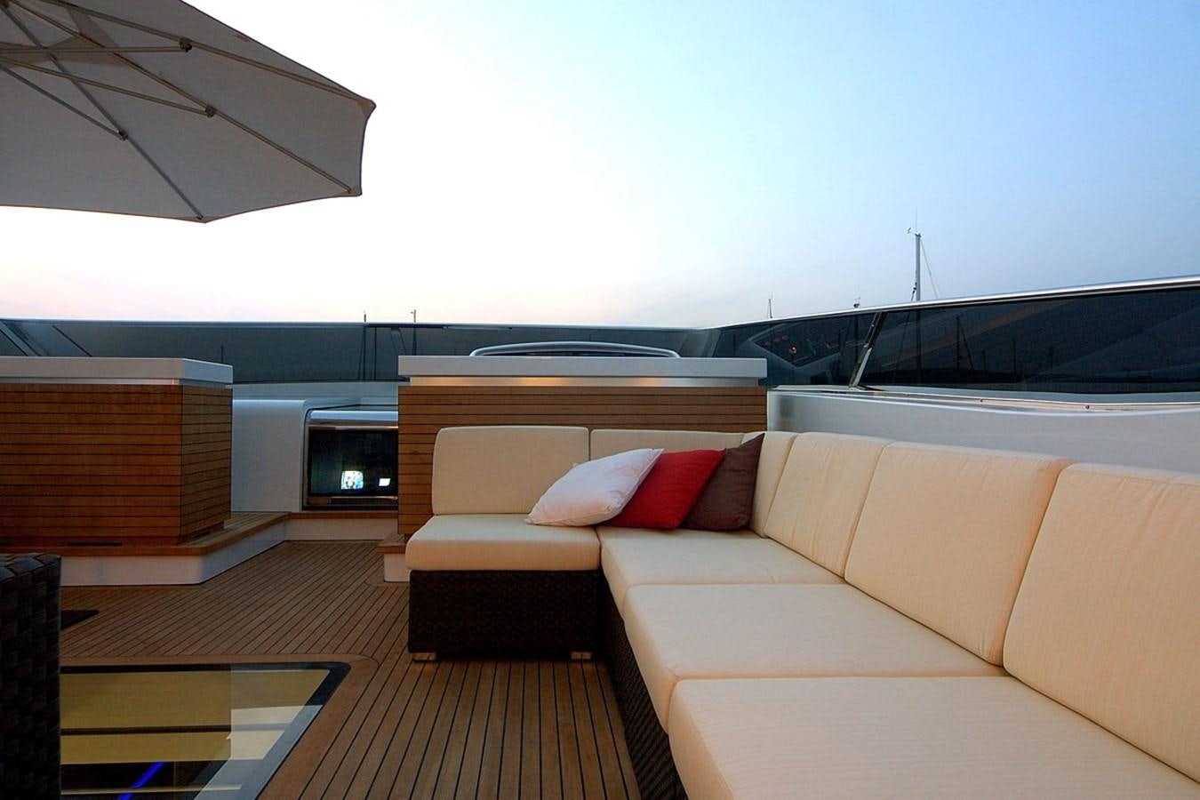 a living room with a couch and a tv aboard MIKYMAR Yacht for Sale