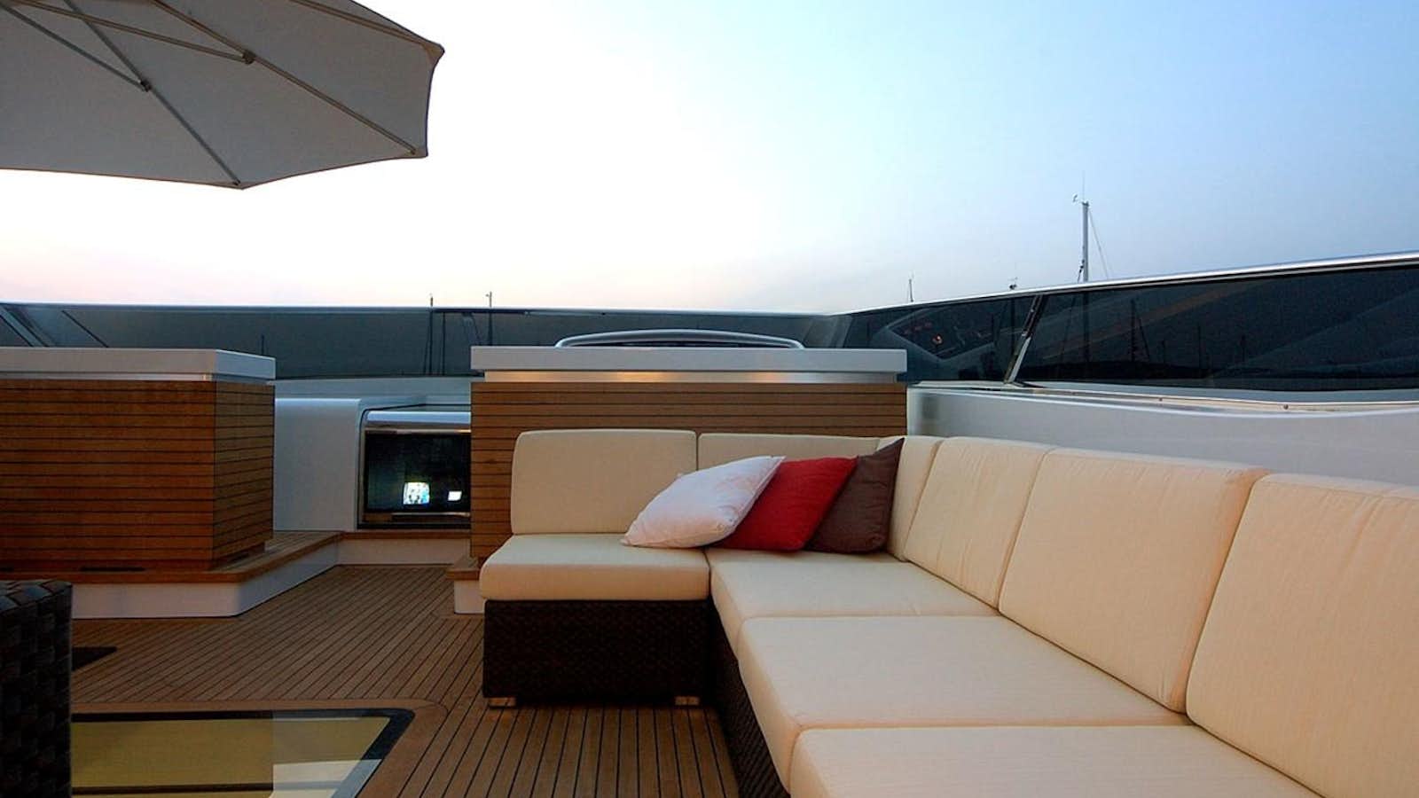 a living room with a couch and a tv aboard MIKYMAR Yacht for Sale