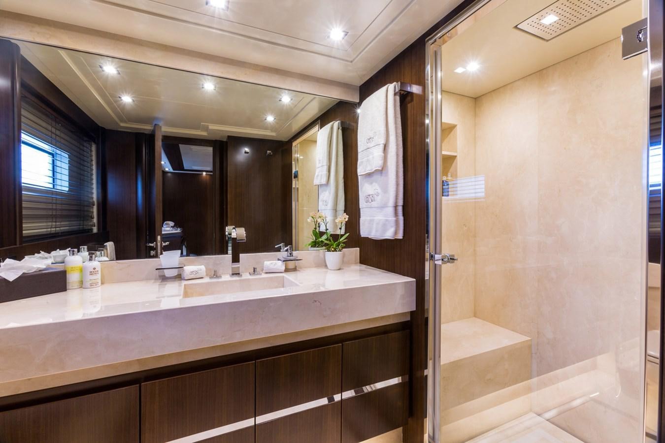 a bathroom with a large mirror aboard GATSBY Yacht for Sale