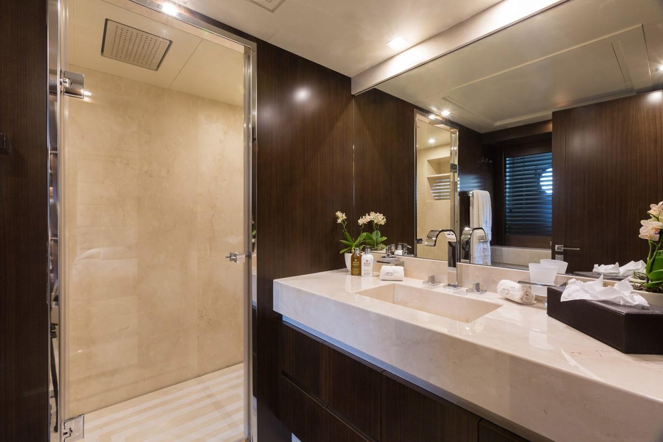 a bathroom with a large shower aboard GATSBY Yacht for Sale
