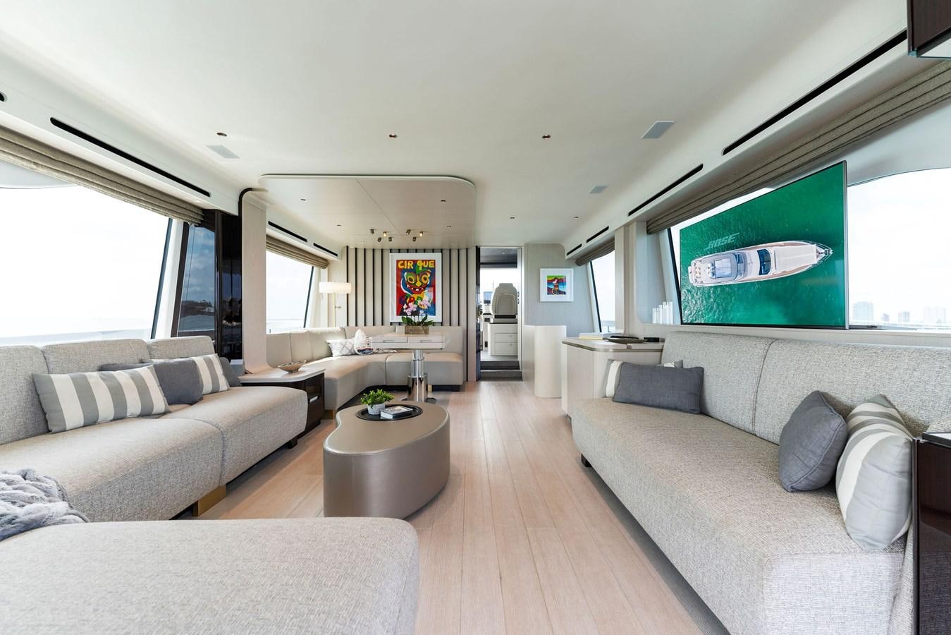 a living room with a large sofa aboard NENA Yacht for Sale