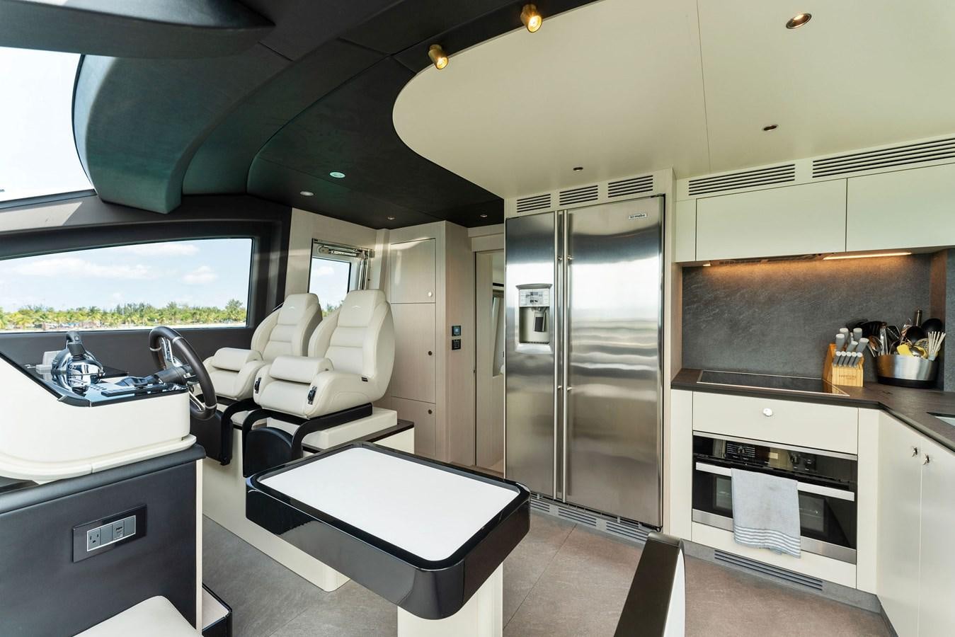 a room with a bed and a sink aboard NENA Yacht for Sale