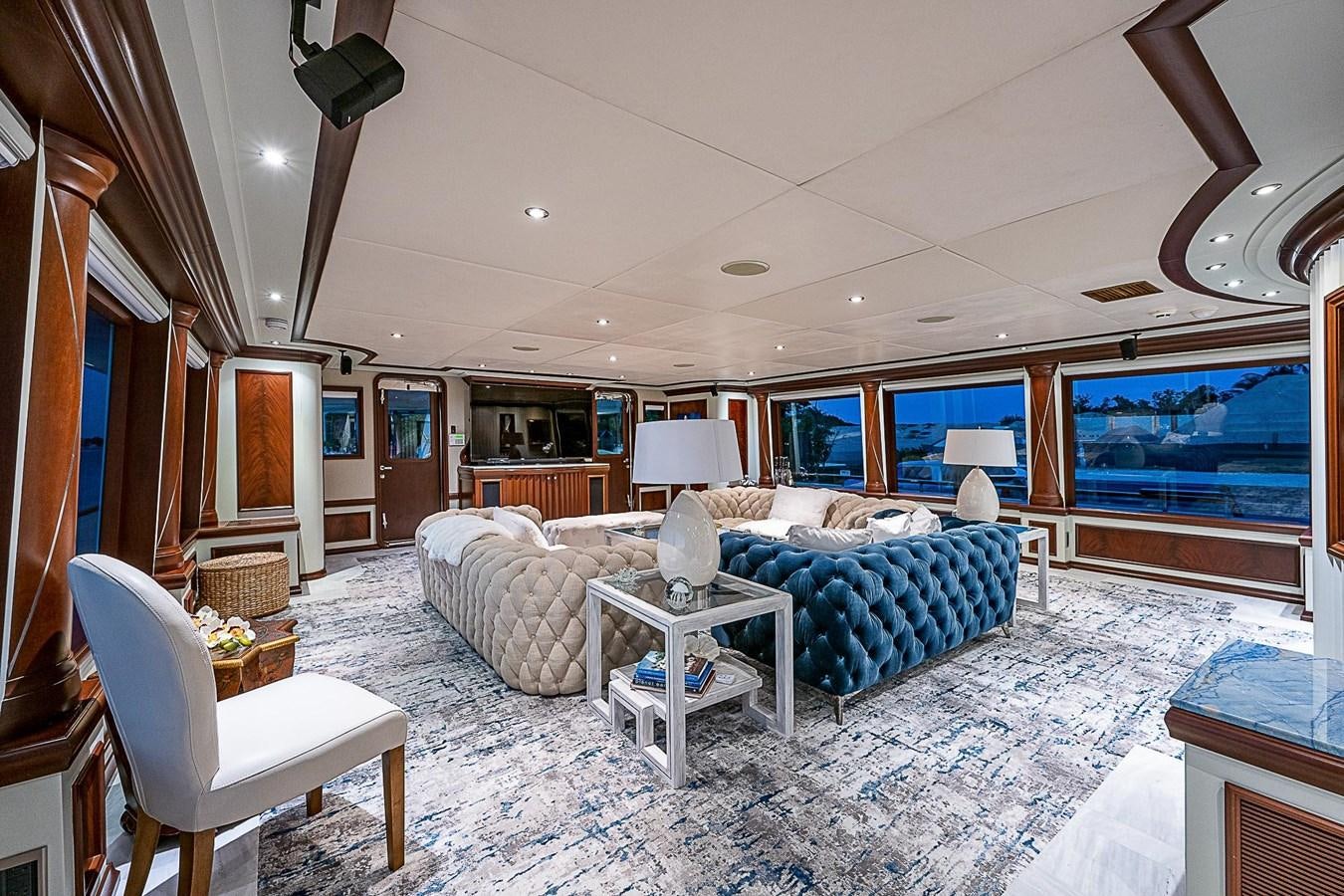 a living room with a large window aboard LAGNIAPPE Yacht for Sale