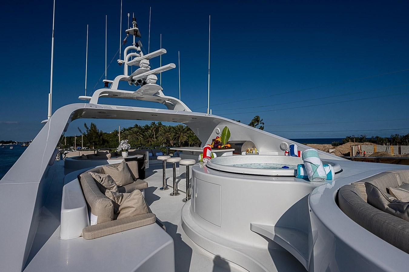 a boat with a person on it aboard LAGNIAPPE Yacht for Sale
