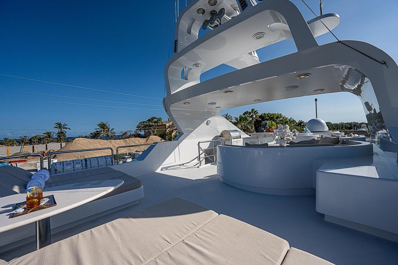 a large white boat on a beach aboard LAGNIAPPE Yacht for Sale