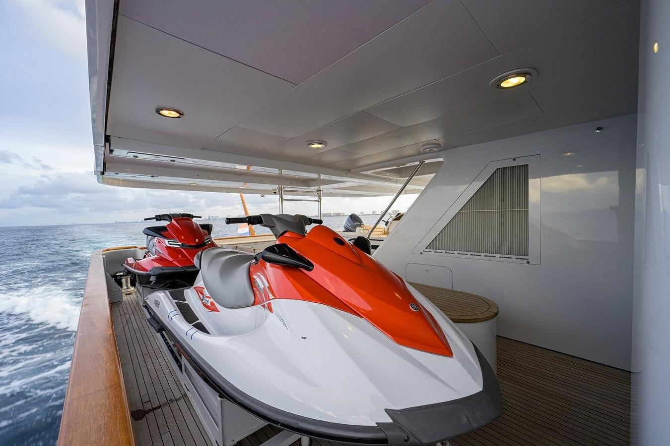a boat with kayaks on it aboard LAGNIAPPE Yacht for Sale