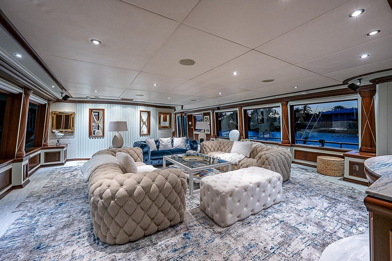 a living room with a large window aboard LAGNIAPPE Yacht for Sale