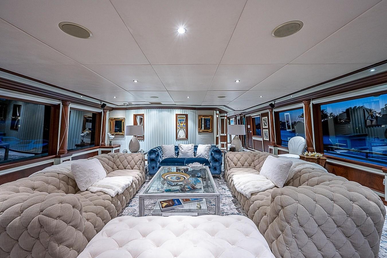 a living room with a large window aboard LAGNIAPPE Yacht for Sale