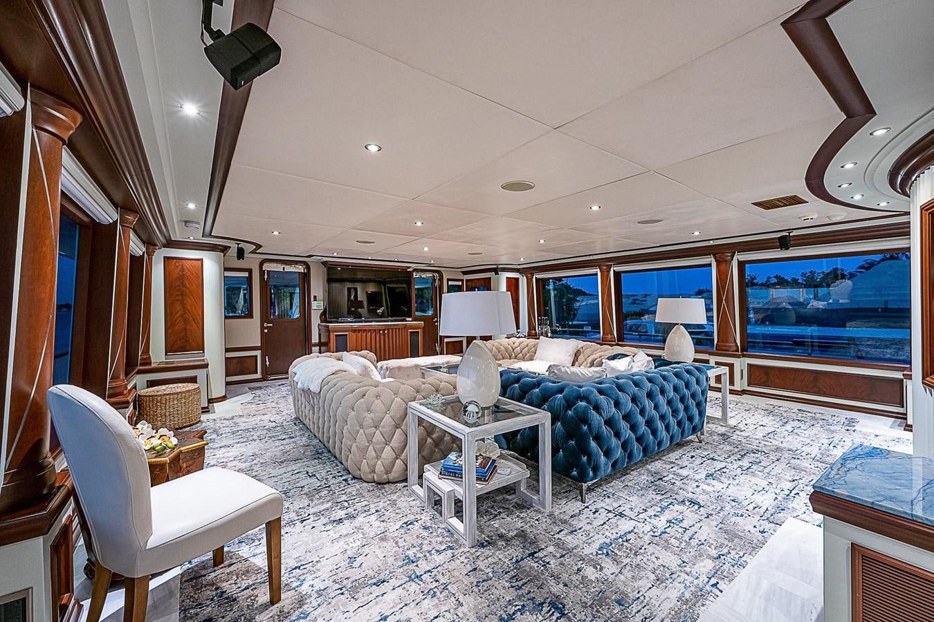 a living room with a large window aboard LAGNIAPPE Yacht for Sale