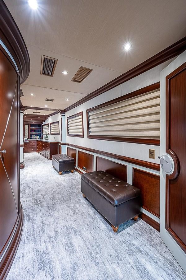 a room with a couch and a chair aboard LAGNIAPPE Yacht for Sale