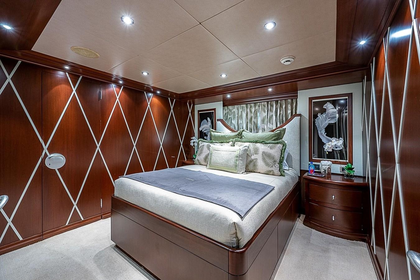 a bed in a room aboard LAGNIAPPE Yacht for Sale