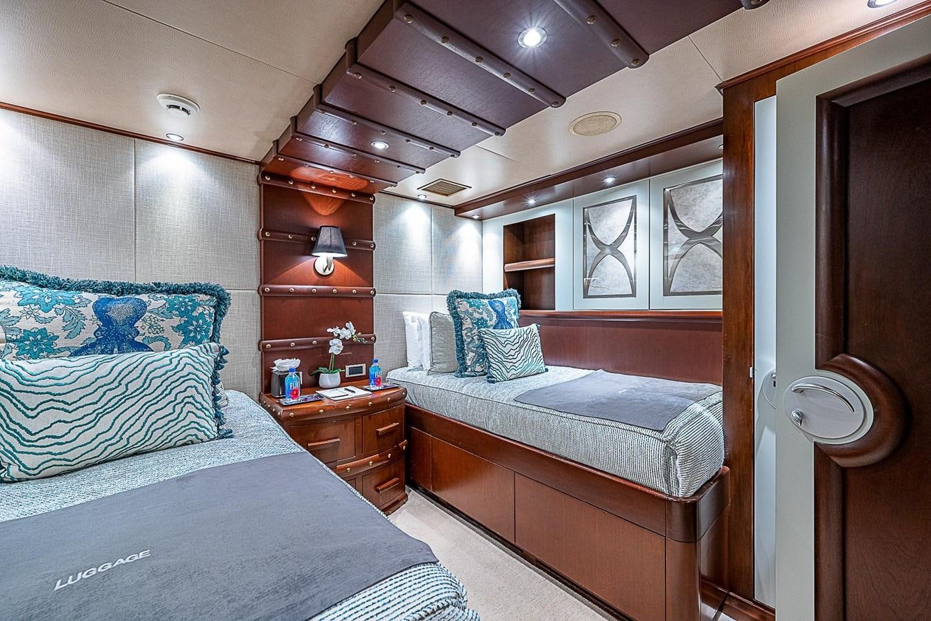 a couple of beds in a room aboard LAGNIAPPE Yacht for Sale
