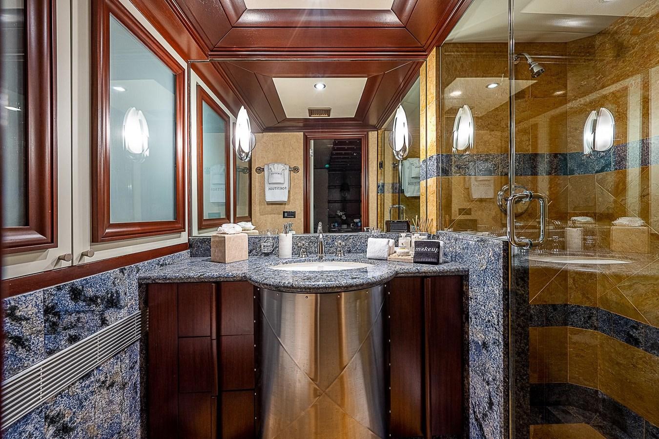 a bathroom with a countertop sink aboard LAGNIAPPE Yacht for Sale