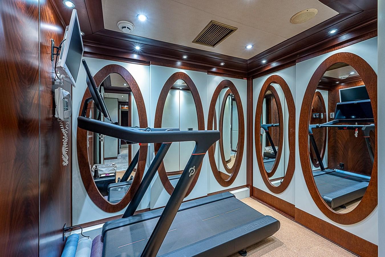 a large room with a large mirror aboard LAGNIAPPE Yacht for Sale