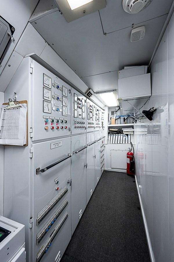 a hallway with white cabinets aboard LAGNIAPPE Yacht for Sale