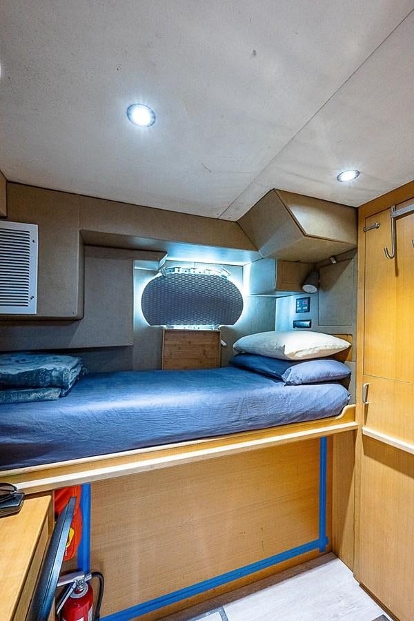 a room with bunk beds aboard LAGNIAPPE Yacht for Sale