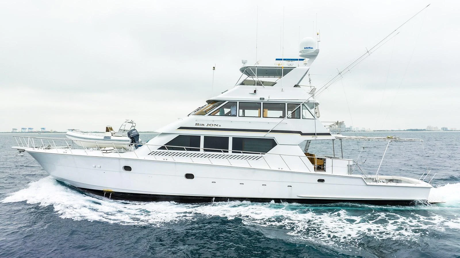 a white yacht in the water aboard SIR JON II Yacht for Sale