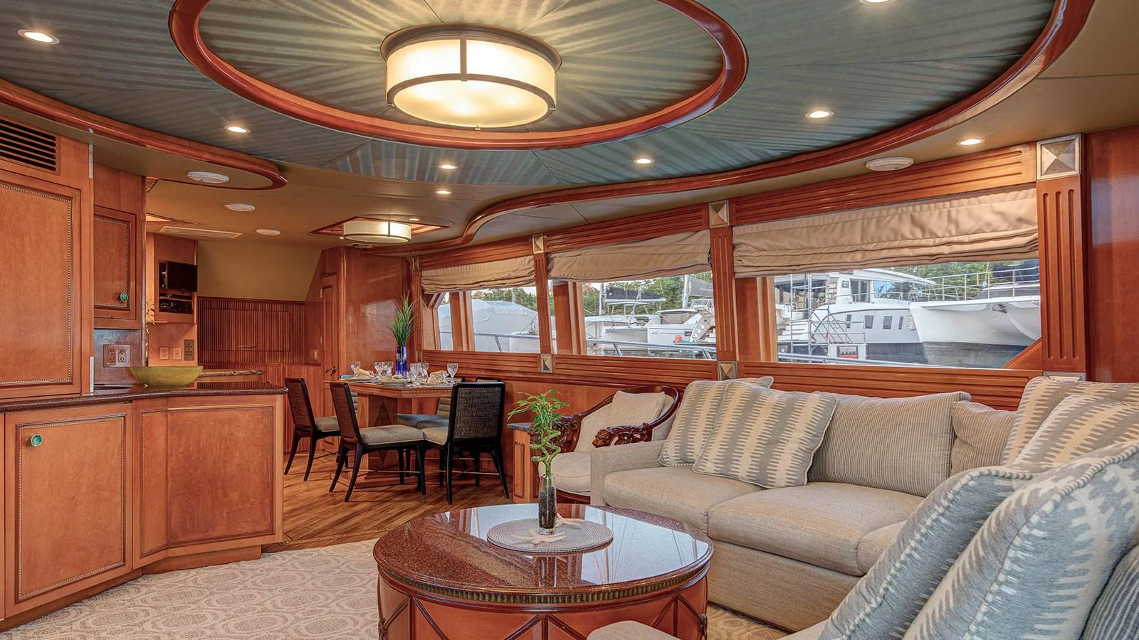 a living room with a large window aboard SIR JON II Yacht for Sale