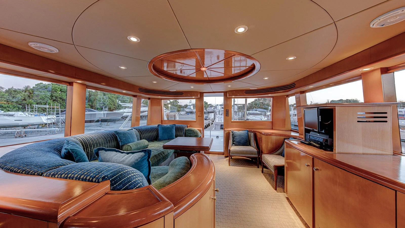 a living room with a couch and a tv aboard SIR JON II Yacht for Sale