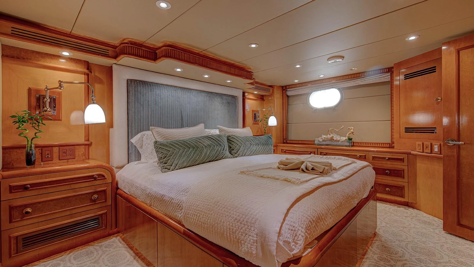 a large bedroom with a large bed aboard SIR JON II Yacht for Sale