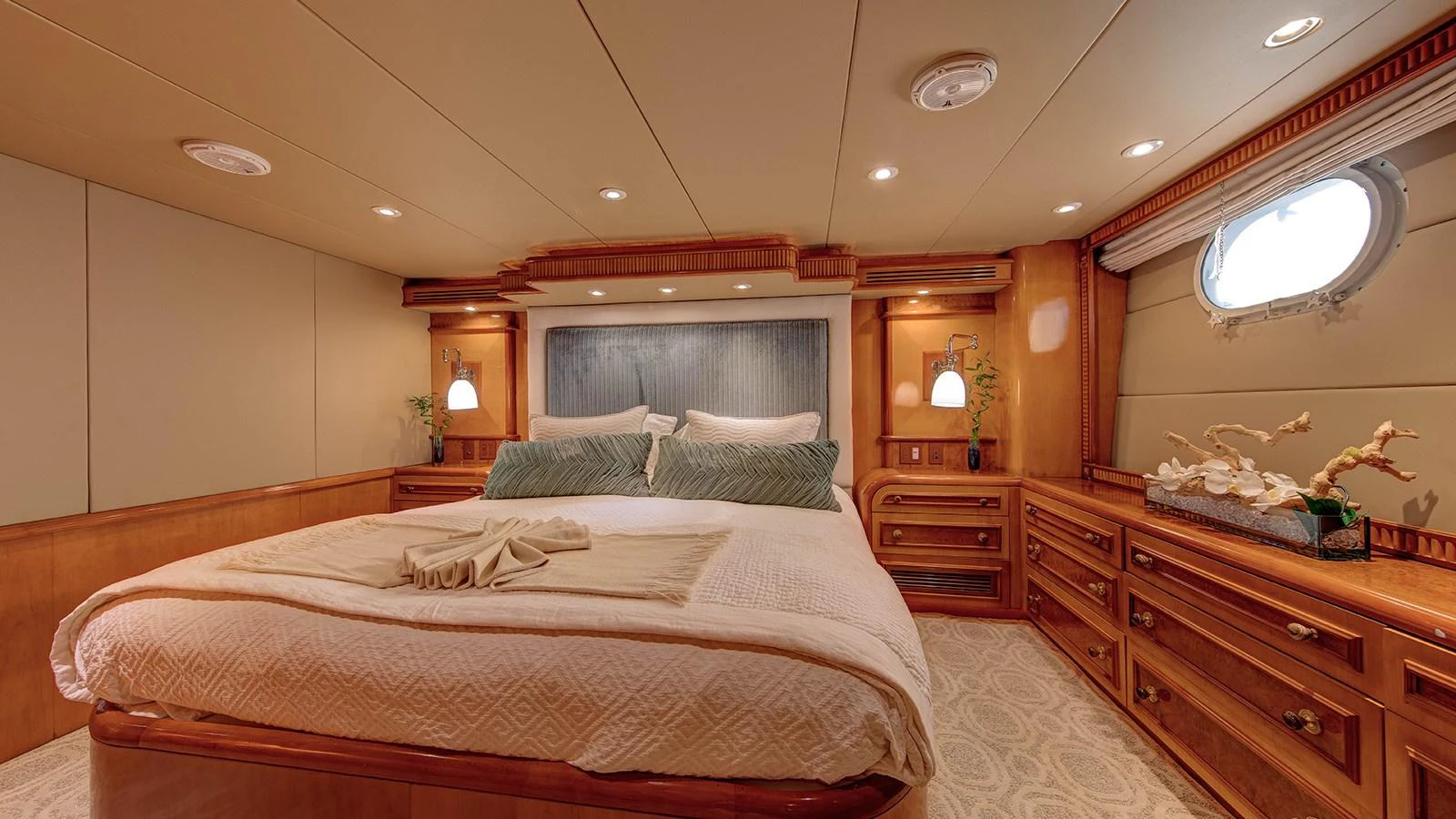 a large bedroom with a large bed aboard SIR JON II Yacht for Sale