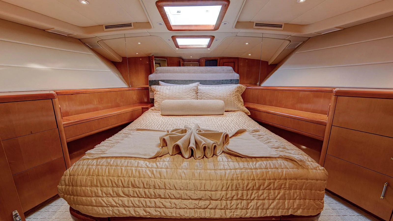 a bed in a room aboard SIR JON II Yacht for Sale