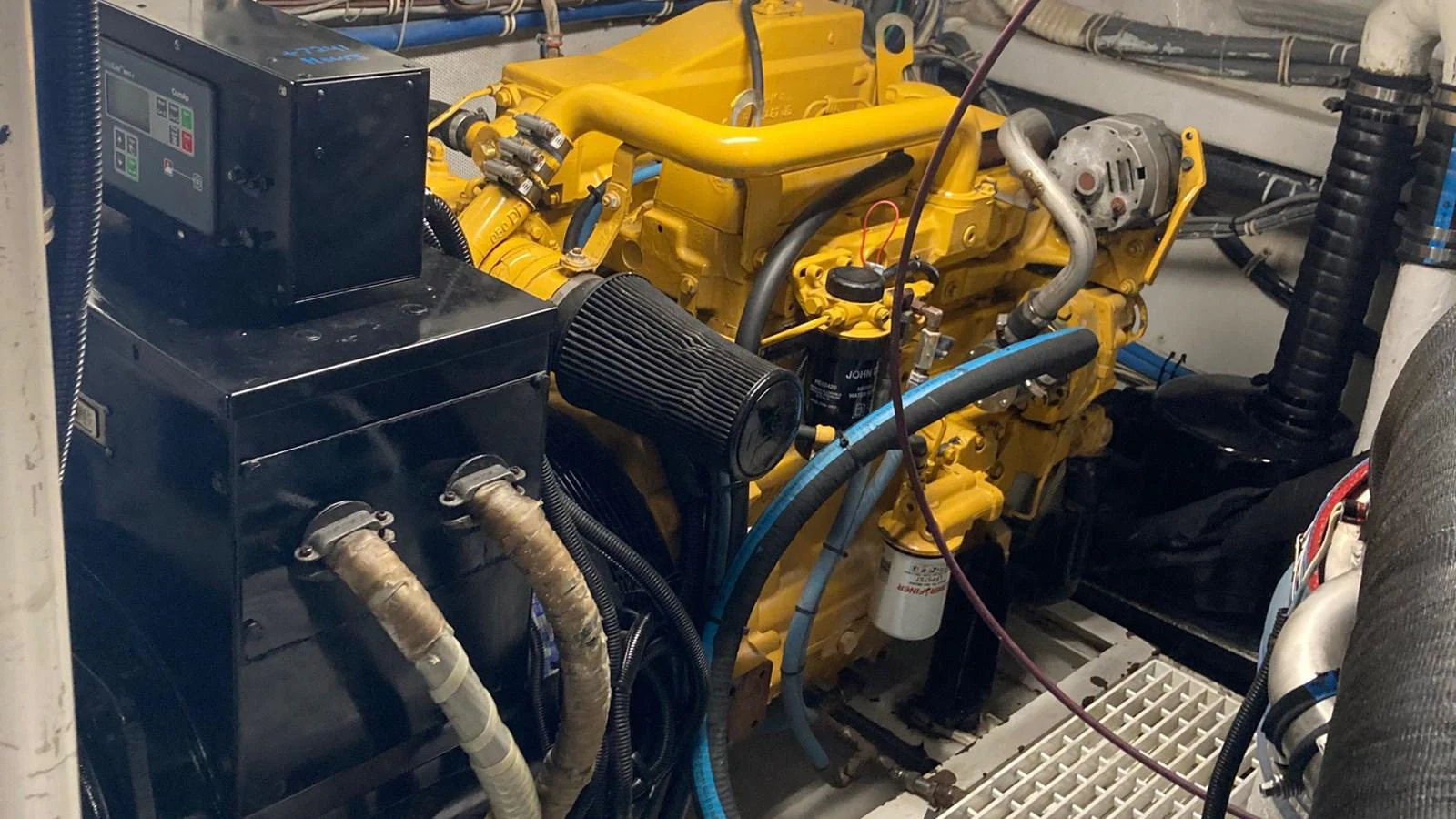 a yellow machine with a black handle aboard SIR JON II Yacht for Sale