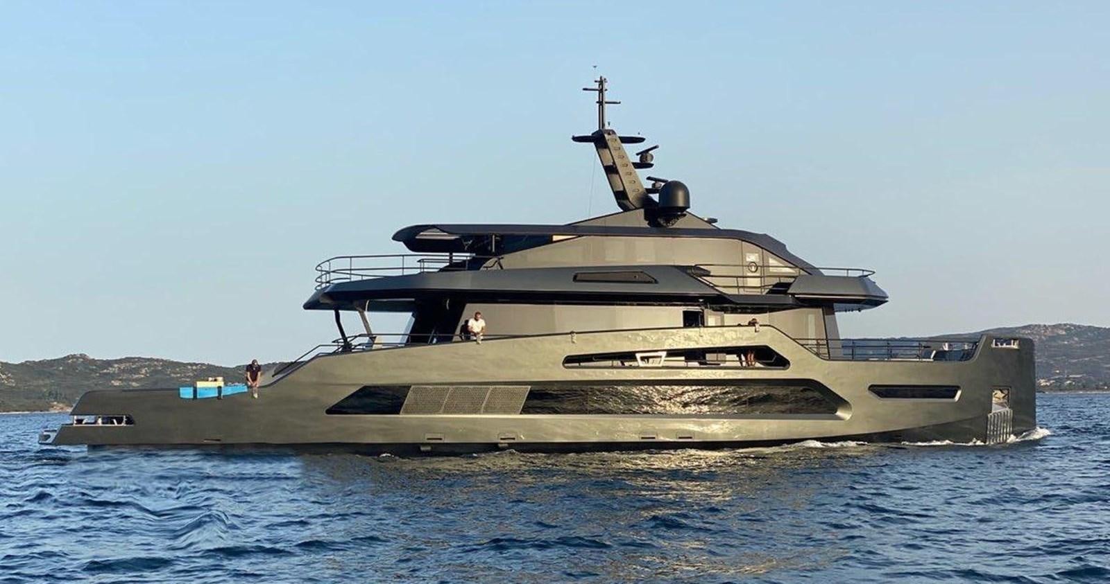 a large military ship in the water aboard M 125 Yacht for Sale