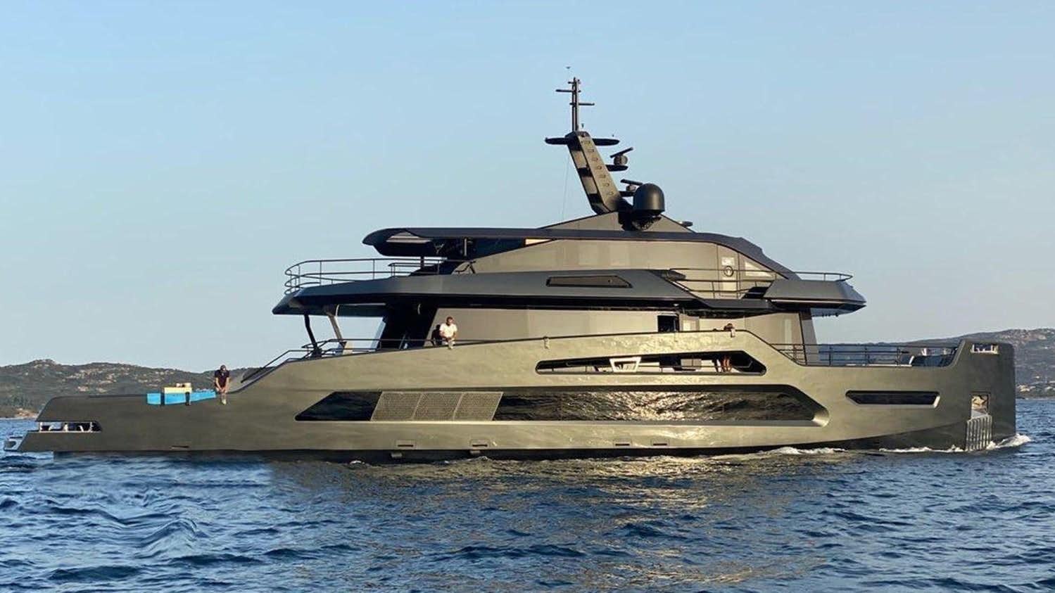 a large military ship in the water aboard M 125 Yacht for Sale