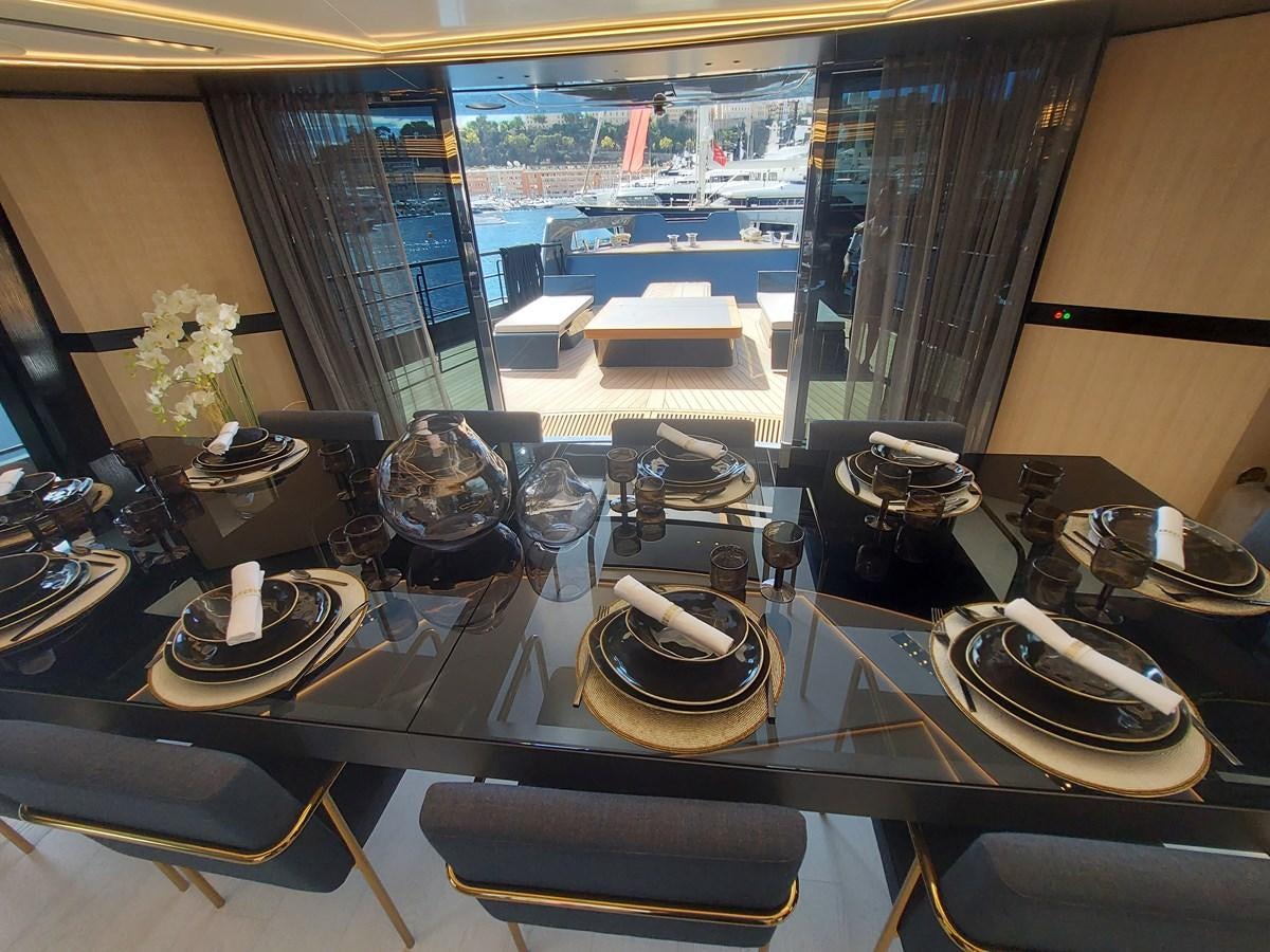 a drum set on a table aboard M 125 Yacht for Sale