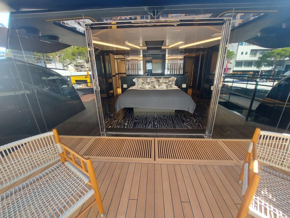a train with a bench aboard M 125 Yacht for Sale