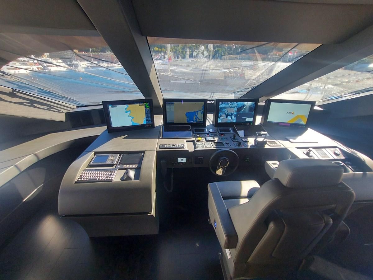an airplane cockpit with many screens aboard M 125 Yacht for Sale