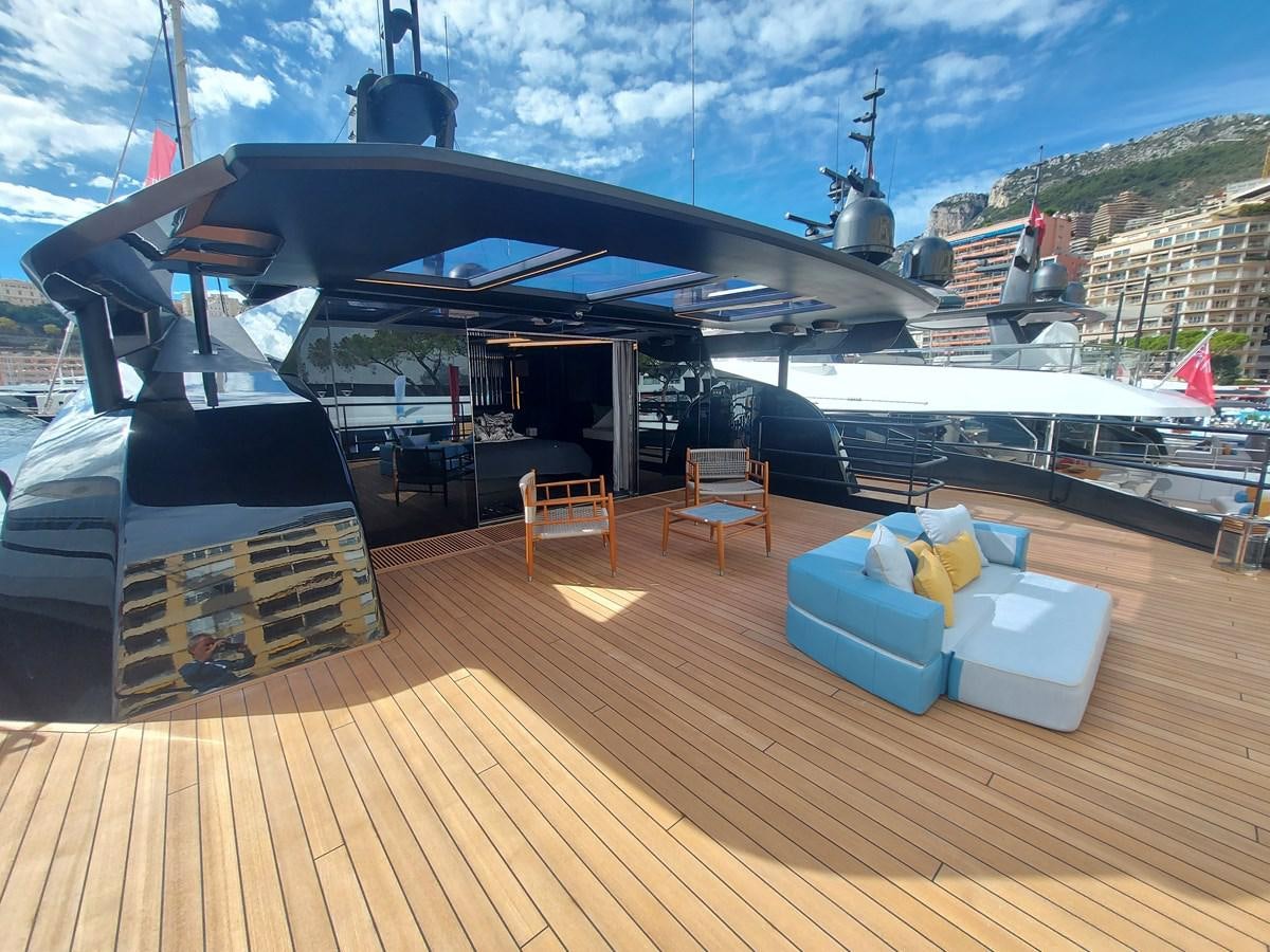 a deck with a large ship in it aboard M 125 Yacht for Sale