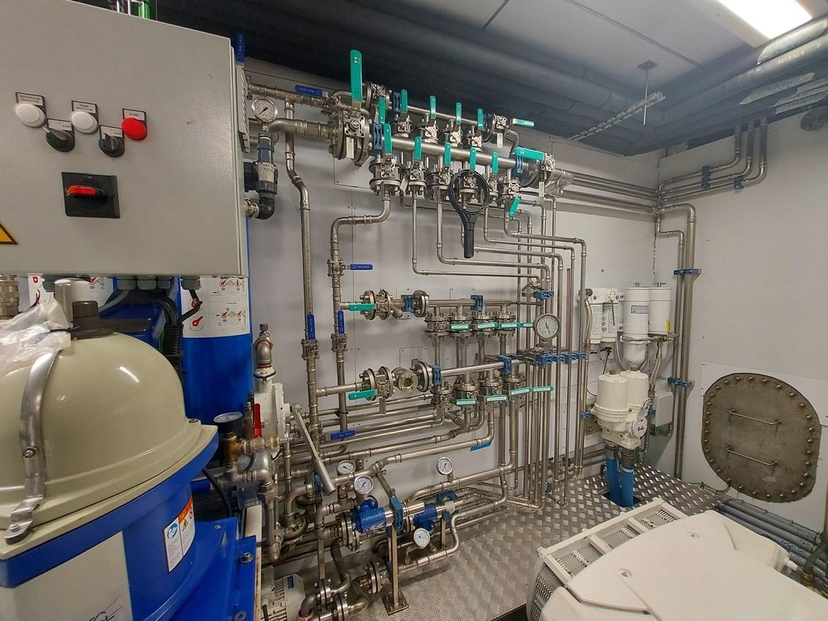 a room with several machines aboard M 125 Yacht for Sale