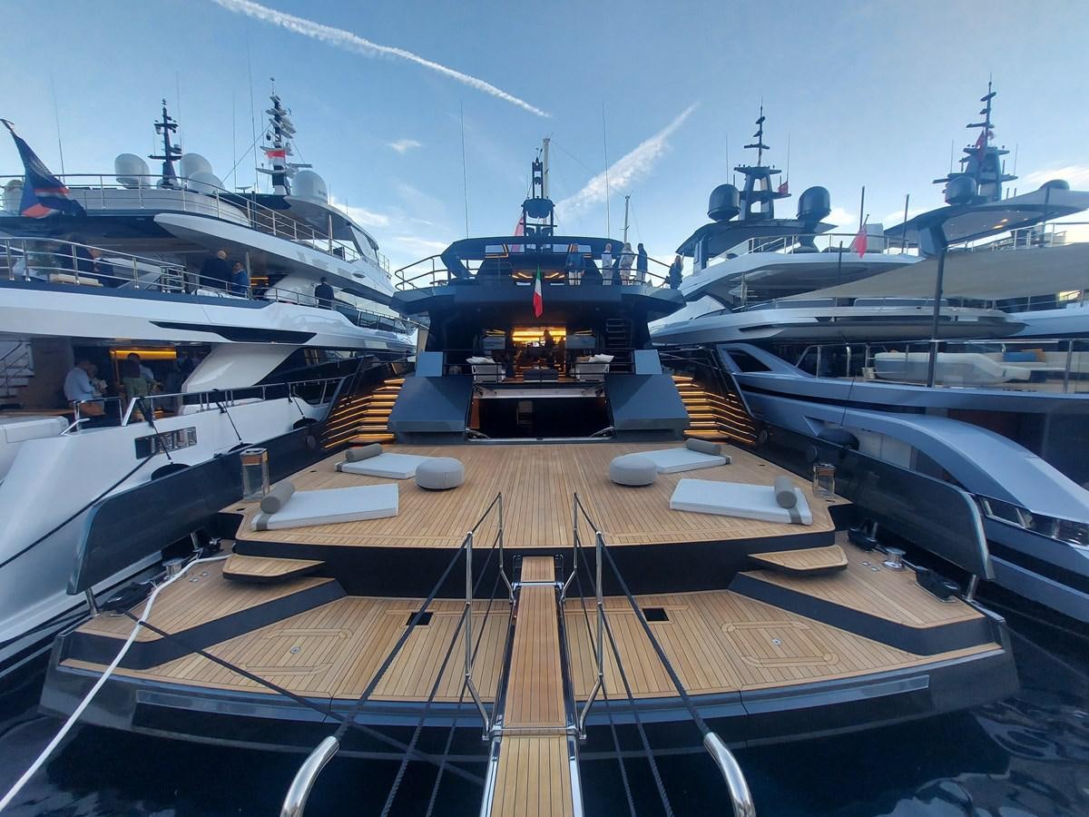 a deck of a ship with several boats in it aboard M 125 Yacht for Sale