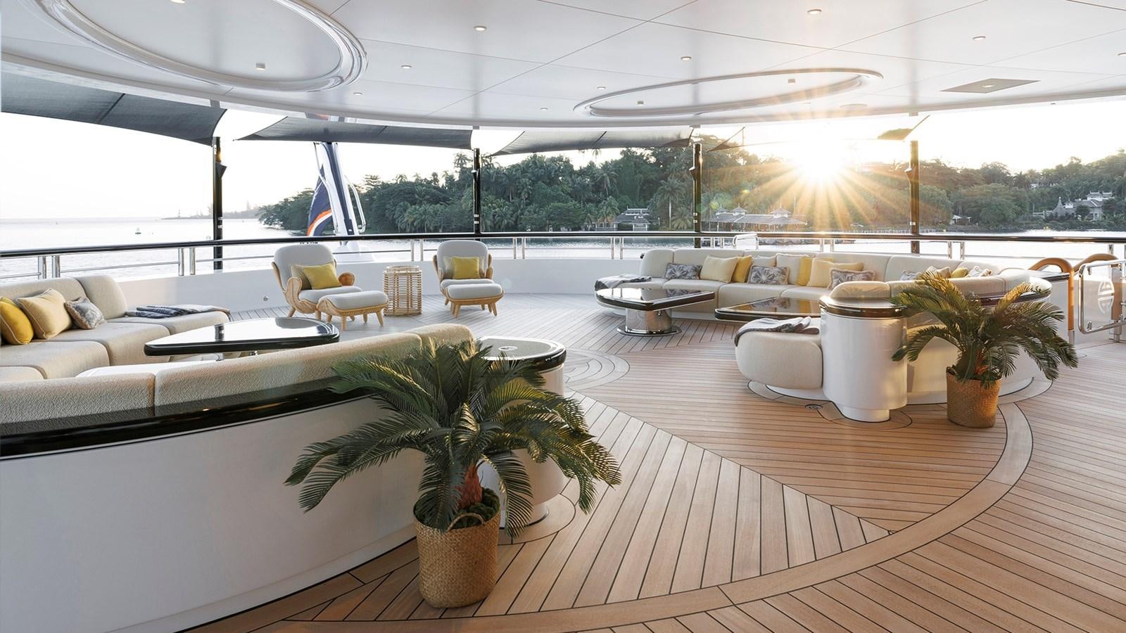 a room with a table and chairs aboard AHPO Yacht for Sale
