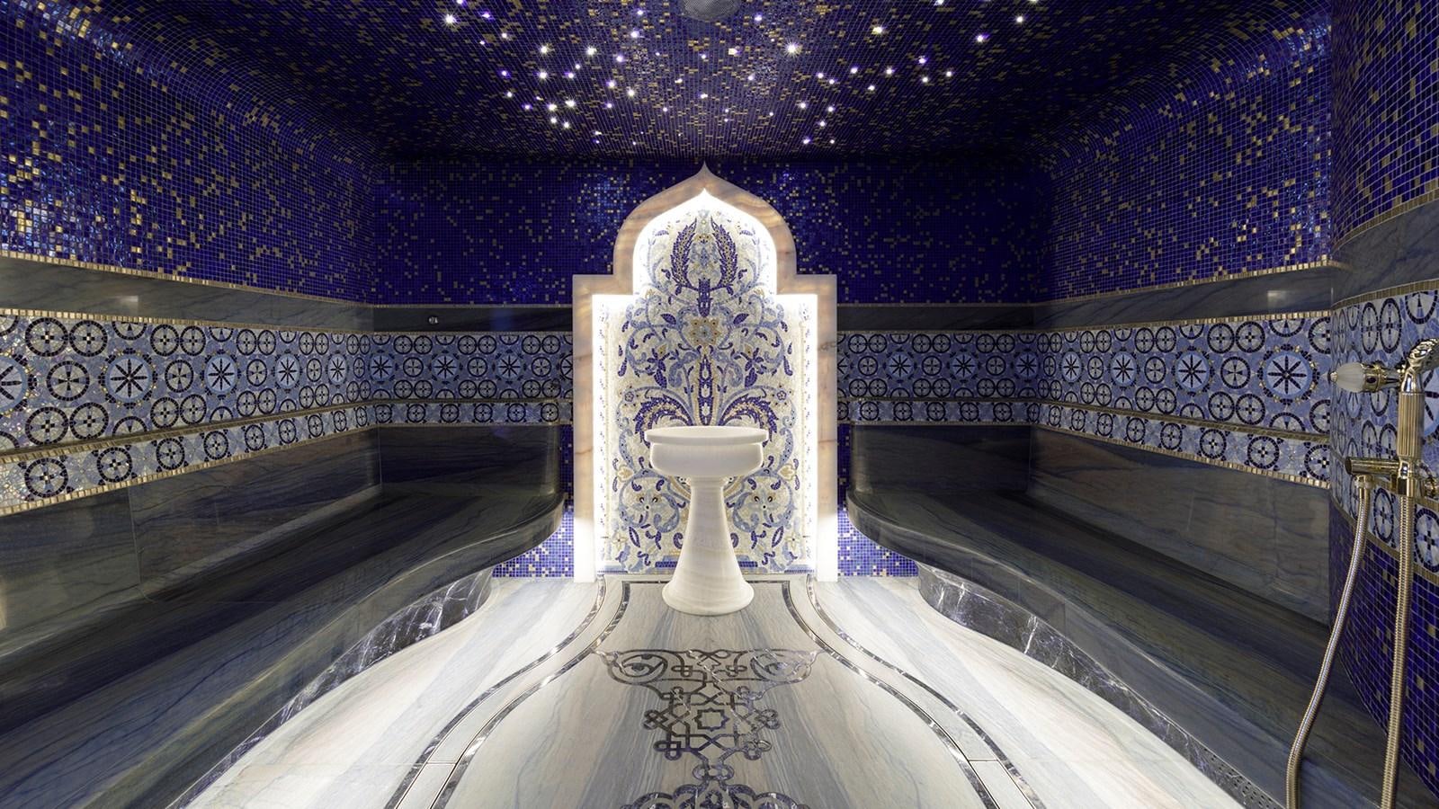 a large white statue in a room aboard AHPO Yacht for Sale