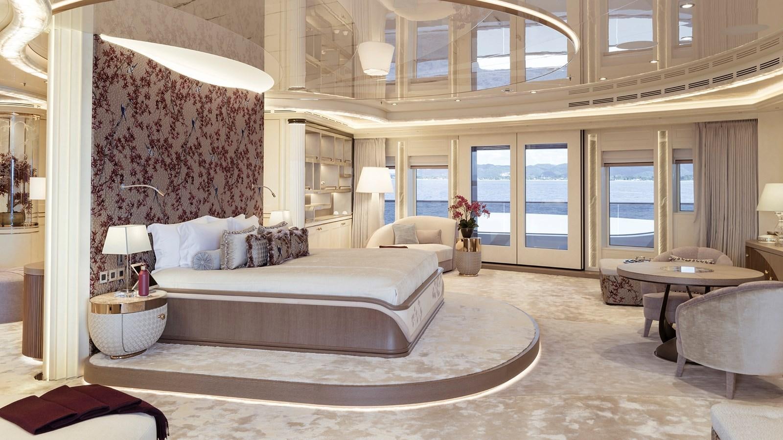 a large bedroom with a large bed aboard AHPO Yacht for Sale