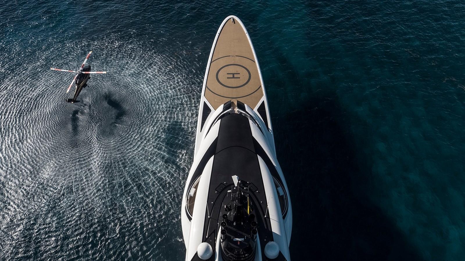 a couple of jets flying over the ocean aboard AHPO Yacht for Sale