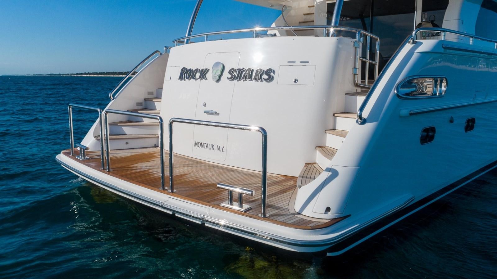 a white boat in the water aboard E84 Yacht for Sale