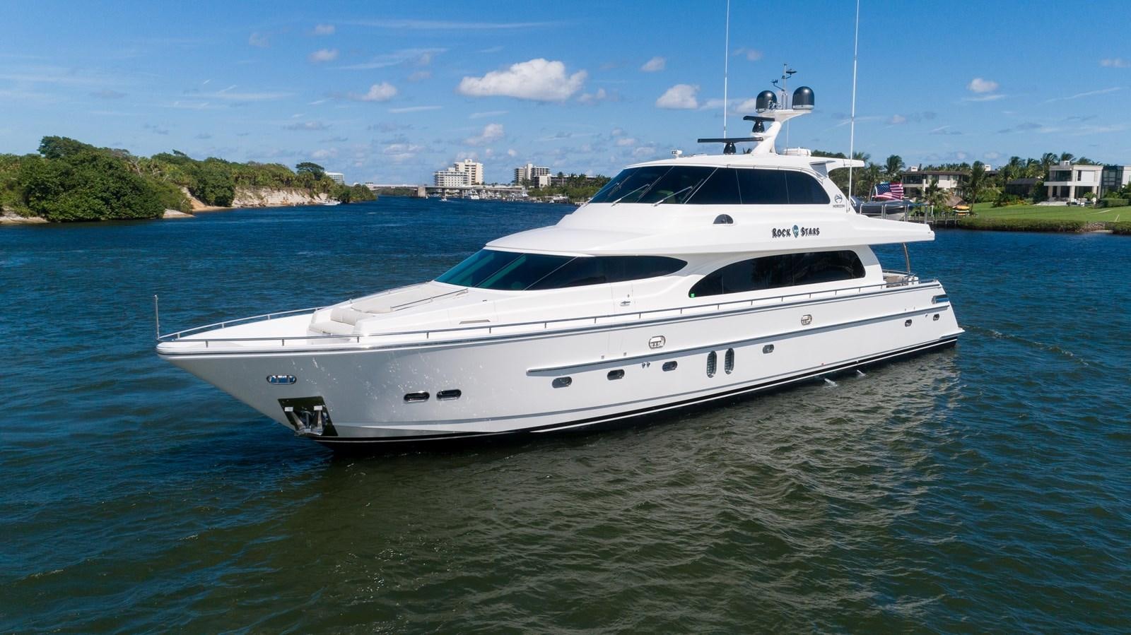a white yacht in the water aboard E84 Yacht for Sale